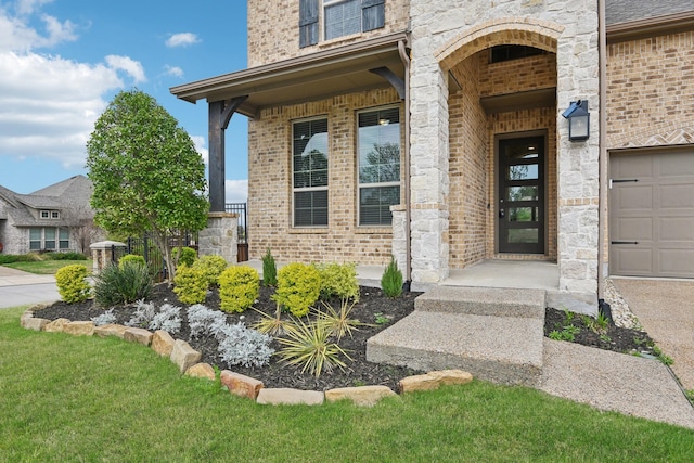 1909 Old Charm Trl, Wylie, TX 75098 - property entrance featuring stone siding and brick siding