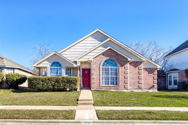 7954 Roundtable Rd, Frisco, TX 75035 - view of front of property featuring a front yard and brick siding