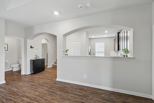 1616 Mackinac Dr, Crowley, TX 76036 - interior space with stairs, recessed lighting, dark wood finished floors, arched walkways, and baseboards