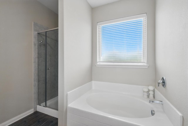 1616 Mackinac Dr, Crowley, TX 76036 - full bathroom featuring a stall shower, a garden tub, and wood finished floors