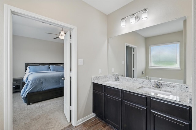 1616 Mackinac Dr, Crowley, TX 76036 - full bath featuring double vanity, ensuite bath, a ceiling fan, and a sink