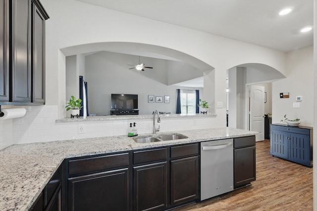 1616 Mackinac Dr, Crowley, TX 76036 - kitchen featuring a sink, tasteful backsplash, ceiling fan, stainless steel dishwasher, and light wood-style floors