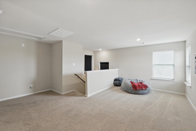 1616 Mackinac Dr, Crowley, TX 76036 - unfurnished room featuring attic access, carpet, an upstairs landing, recessed lighting, and baseboards