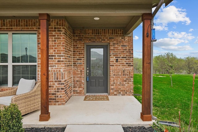 1616 Mackinac Dr, Crowley, TX 76036 - doorway to property with a yard and brick siding