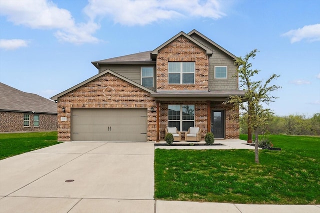 craftsman house featuring a front lawn, concrete driveway, brick siding, and a garage
