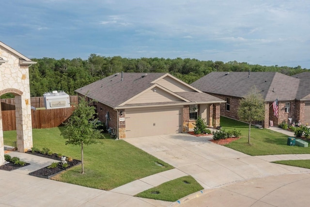 view of front of house with a front yard, a garage, brick siding, and concrete driveway