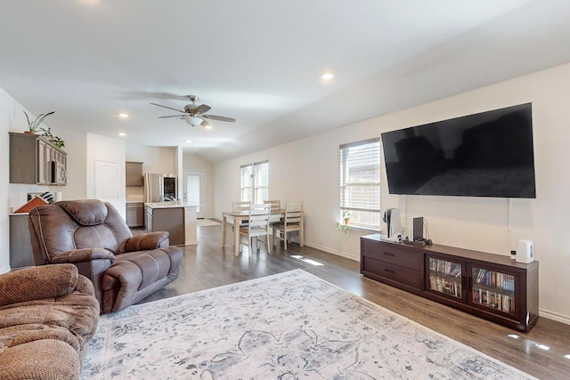 living area featuring a ceiling fan, dark wood-style floors, baseboards, and recessed lighting
