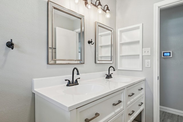 bathroom with double vanity