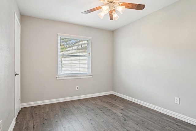 unfurnished room with wood finished floors, ceiling fan, and baseboards