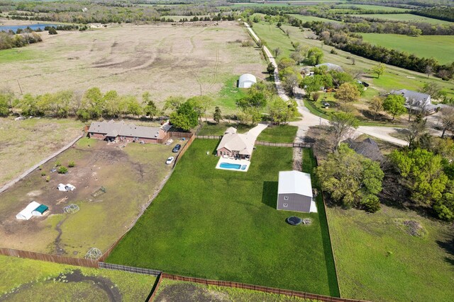 aerial view featuring a rural view and a water view