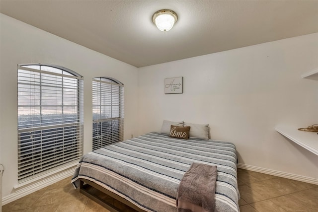 4122 Cory Lee Ct, Arlington, TX 76015 - tiled bedroom featuring baseboards