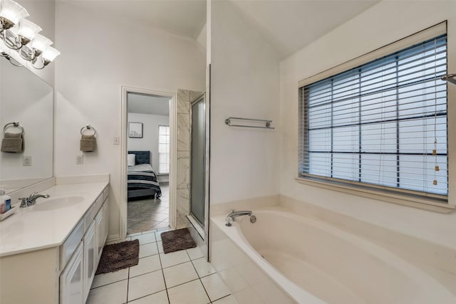 4122 Cory Lee Ct, Arlington, TX 76015 - ensuite bathroom featuring vanity, a bath, tile patterned flooring, a shower stall, and a chandelier