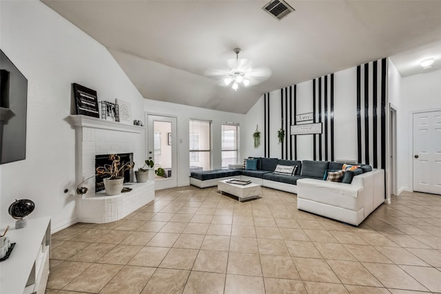 4122 Cory Lee Ct, Arlington, TX 76015 - living room with light tile patterned floors, lofted ceiling, a brick fireplace, and ceiling fan