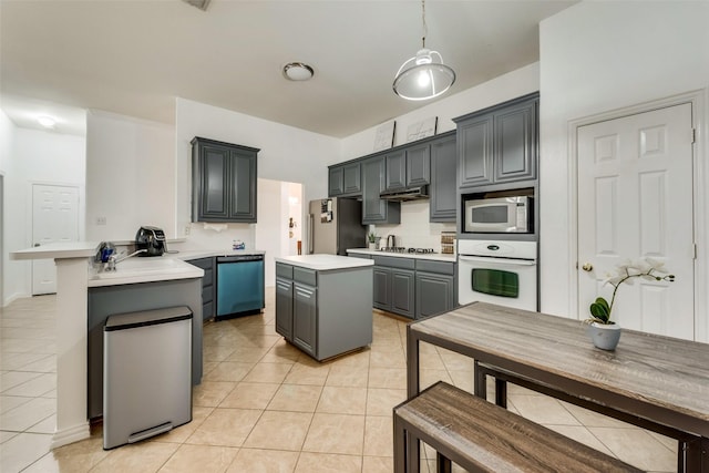 4122 Cory Lee Ct, Arlington, TX 76015 - kitchen featuring stainless steel appliances, a peninsula, light tile patterned flooring, under cabinet range hood, and a center island