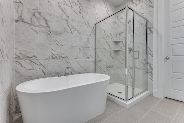 1716 Bradford Pear Way, Celina, TX 75078 - full bath featuring a shower stall, a soaking tub, and tile patterned flooring