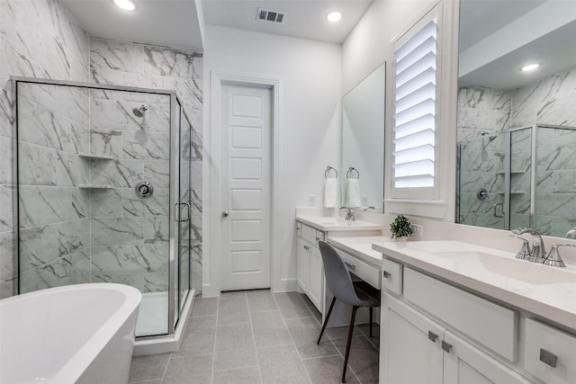 1716 Bradford Pear Way, Celina, TX 75078 - bathroom featuring a stall shower, a freestanding tub, vanity, recessed lighting, and tile patterned flooring