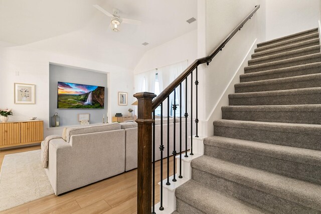 5108 Shallow Pond Dr, Little Elm, TX 76227 - stairs featuring wood finished floors, lofted ceiling, and ceiling fan