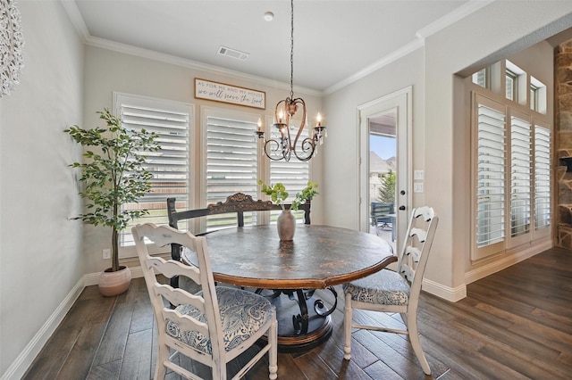 dining room featuring baseboards, visible vents, dark wood-type flooring, and an inviting chandelier