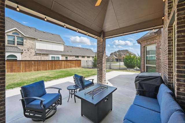 view of patio / terrace with fence, a grill, an outdoor living space with a fire pit, a residential view, and a gazebo