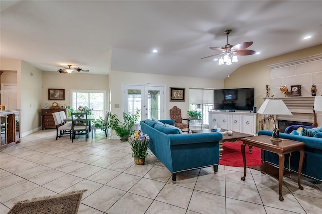 1207 Stafford St, Dallas, TX 75208 - living room with light tile patterned floors, french doors, healthy amount of natural light, ceiling fan, and lofted ceiling
