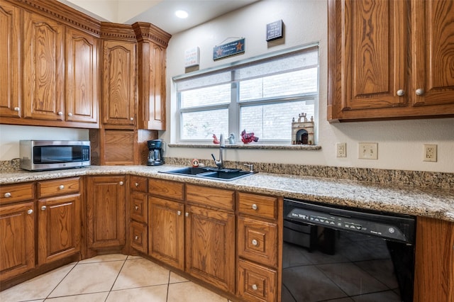 1207 Stafford St, Dallas, TX 75208 - kitchen featuring black dishwasher, stainless steel microwave, a sink, brown cabinetry, and recessed lighting
