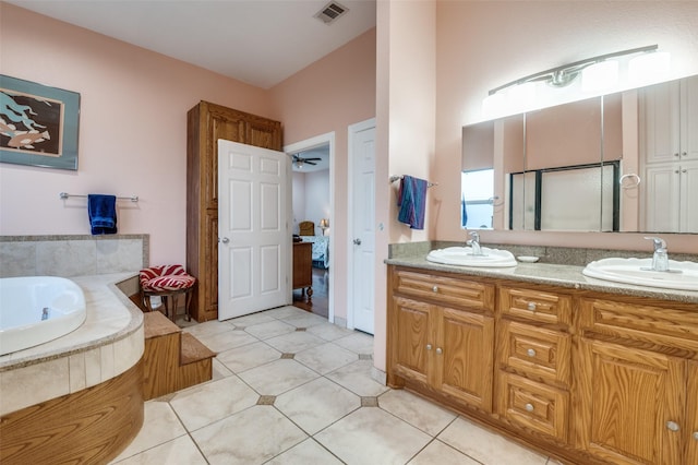 1207 Stafford St, Dallas, TX 75208 - ensuite bathroom featuring double vanity, a bath, and tile patterned flooring
