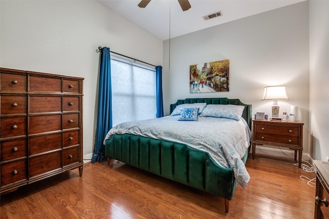 1207 Stafford St, Dallas, TX 75208 - bedroom with wood finished floors, vaulted ceiling, ceiling fan, and baseboards