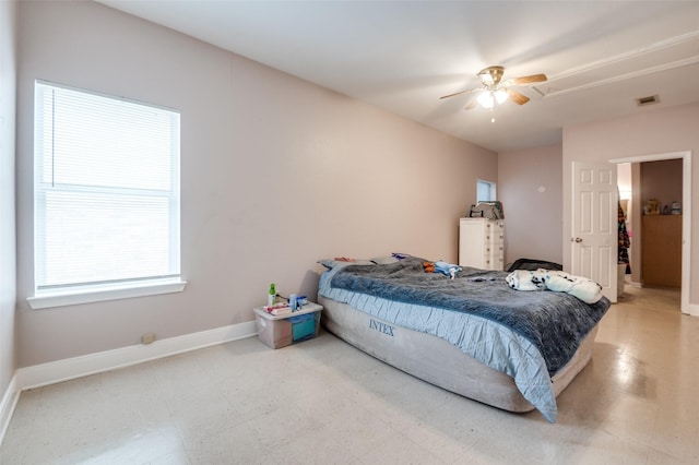 1207 Stafford St, Dallas, TX 75208 - bedroom featuring attic access, baseboards, and a ceiling fan