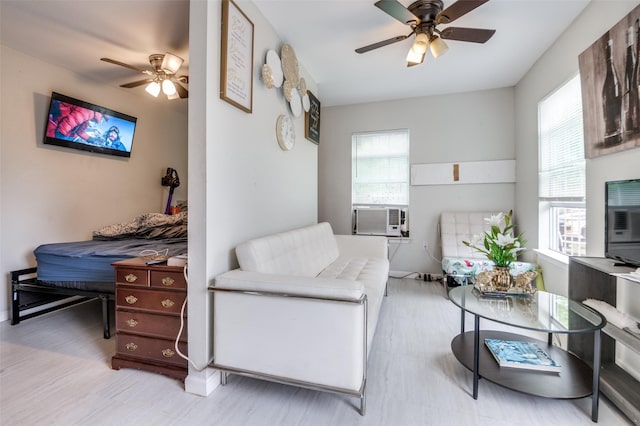 1207 Stafford St, Dallas, TX 75208 - living area with a ceiling fan, cooling unit, healthy amount of natural light, and baseboards