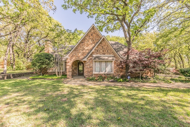 2111 Meadowview Dr, Keller, TX 76262 - tudor-style house featuring brick siding and a front yard