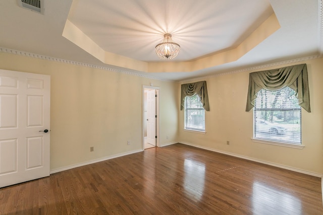 2111 Meadowview Dr, Keller, TX 76262 - spare room with a chandelier, a tray ceiling, visible vents, and a healthy amount of sunlight