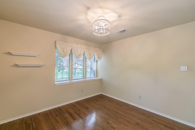 2111 Meadowview Dr, Keller, TX 76262 - unfurnished room with baseboards, wood finished floors, visible vents, and an inviting chandelier
