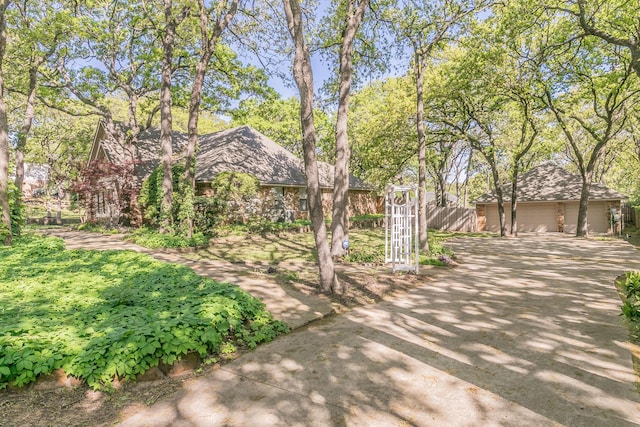 2111 Meadowview Dr, Keller, TX 76262 - view of front of property with fence and an outdoor structure