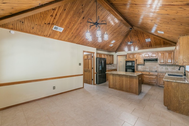 2111 Meadowview Dr, Keller, TX 76262 - kitchen featuring a sink, tasteful backsplash, visible vents, a kitchen island, and black appliances