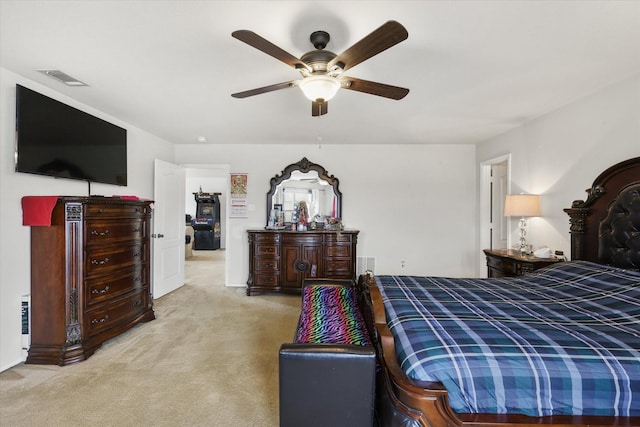 bedroom with visible vents, carpet, and ceiling fan