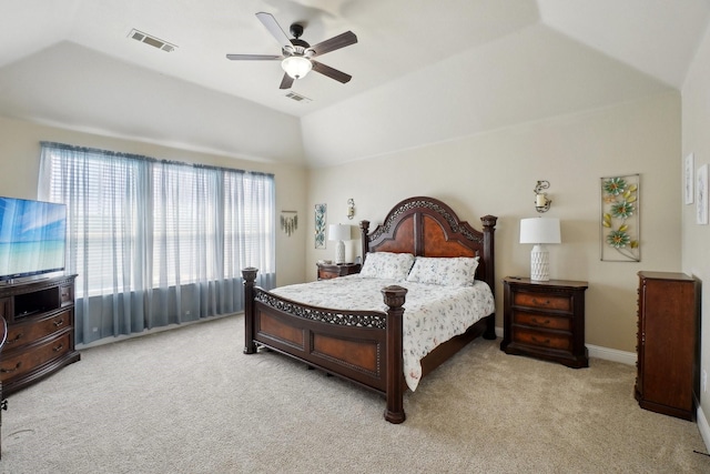 bedroom with visible vents, baseboards, ceiling fan, light carpet, and vaulted ceiling