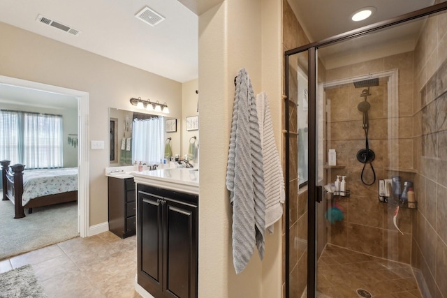 full bathroom featuring a shower stall, visible vents, ensuite bathroom, and vanity