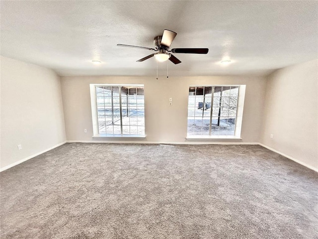 140 Vz County Road 2153, Canton, TX 75103 - carpeted empty room with plenty of natural light, a ceiling fan, a textured ceiling, and baseboards