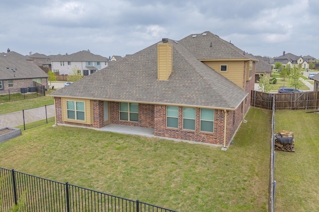 4014 Grove Valley Rd, Midlothian, TX 76065 - back of house featuring roof with shingles, brick siding, a chimney, and a patio
