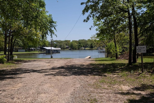 property view of water featuring a boat dock