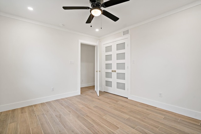 9035 Leaside Dr, Dallas, TX 75238 - unfurnished room featuring light wood finished floors, baseboards, ceiling fan, crown molding, and recessed lighting