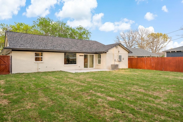 9035 Leaside Dr, Dallas, TX 75238 - rear view of property with a patio area, brick siding, central AC, and roof with shingles