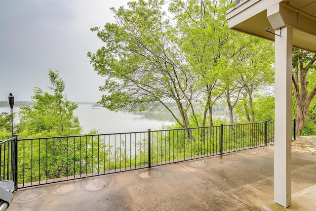 view of patio / terrace featuring a water view