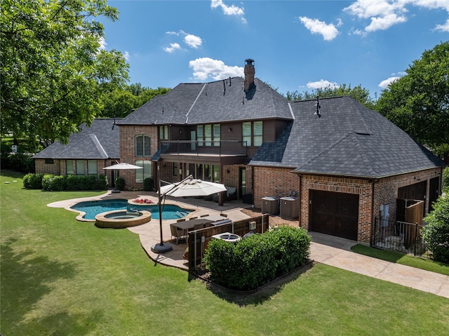 931 Willow Ct, Fairview, TX 75069 - back of property with a balcony, brick siding, central air condition unit, a chimney, and a garage