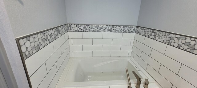 295 Goodnight Trl, Rhome, TX 76078 - full bath featuring a tub with jets