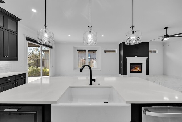 1661 Ethan Cir, Midlothian, TX 76065 - kitchen with a sink, dishwasher, open floor plan, light countertops, and recessed lighting