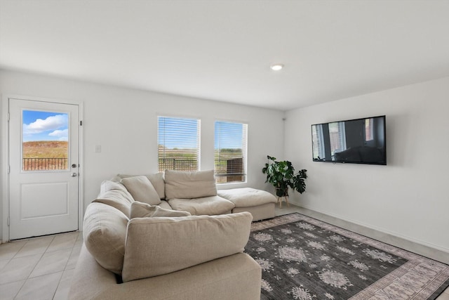 6436 Auburn Dale Rd, Pilot Point, TX 76258 - living room featuring light tile patterned floors and baseboards