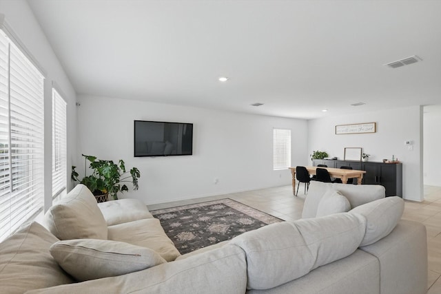 6436 Auburn Dale Rd, Pilot Point, TX 76258 - living area featuring light tile patterned flooring and recessed lighting
