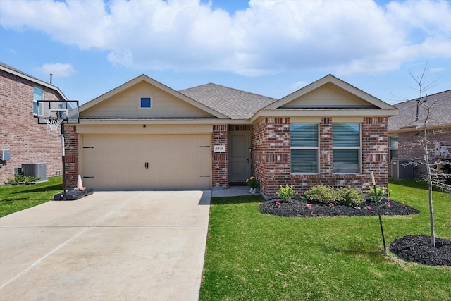 6436 Auburn Dale Rd, Pilot Point, TX 76258 - view of front of property with central air condition unit, brick siding, a front lawn, a garage, and driveway