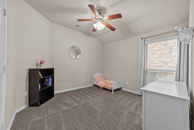 carpeted bedroom featuring a ceiling fan, baseboards, lofted ceiling, and visible vents
